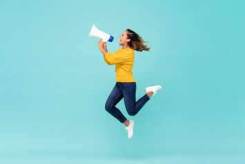girl-with-megaphone-jumping-and-shouting.jpg
